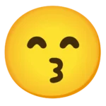Face with kiss emoji blowing a heart, expressing affection, love, and playful romantic vibes